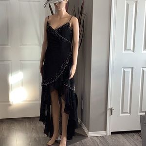 Beautiful black dress worn once. Detailed embellishments, sheer layered bottom.